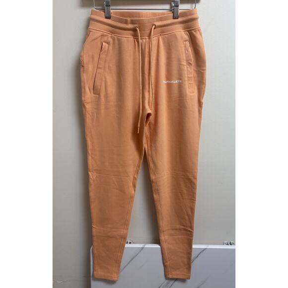 Alphalete Women’s Essential Core Joggers Orange Size M NWOT Slim Fit Sweatpants - Picture 1 of 5
